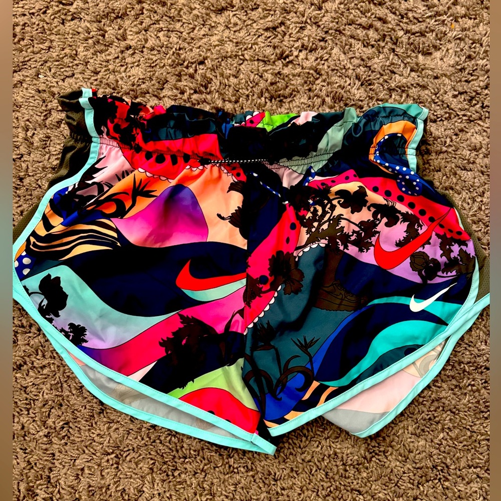 Nike wild print running shorts, fit more like small—never worn